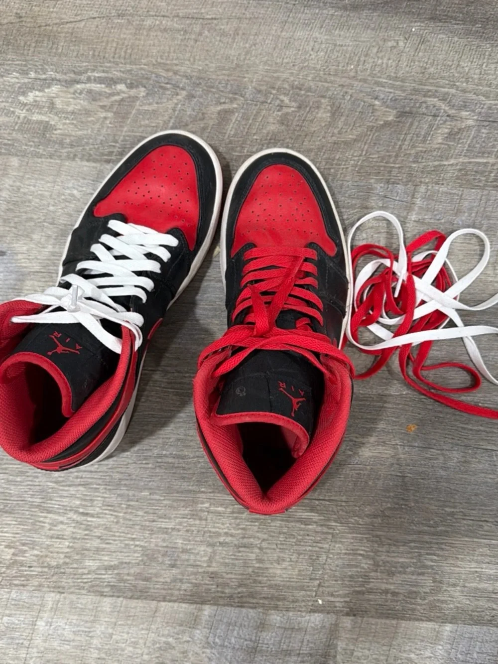 Men’s size 9 Jordan Mid-Top Sneakers in Black and Red